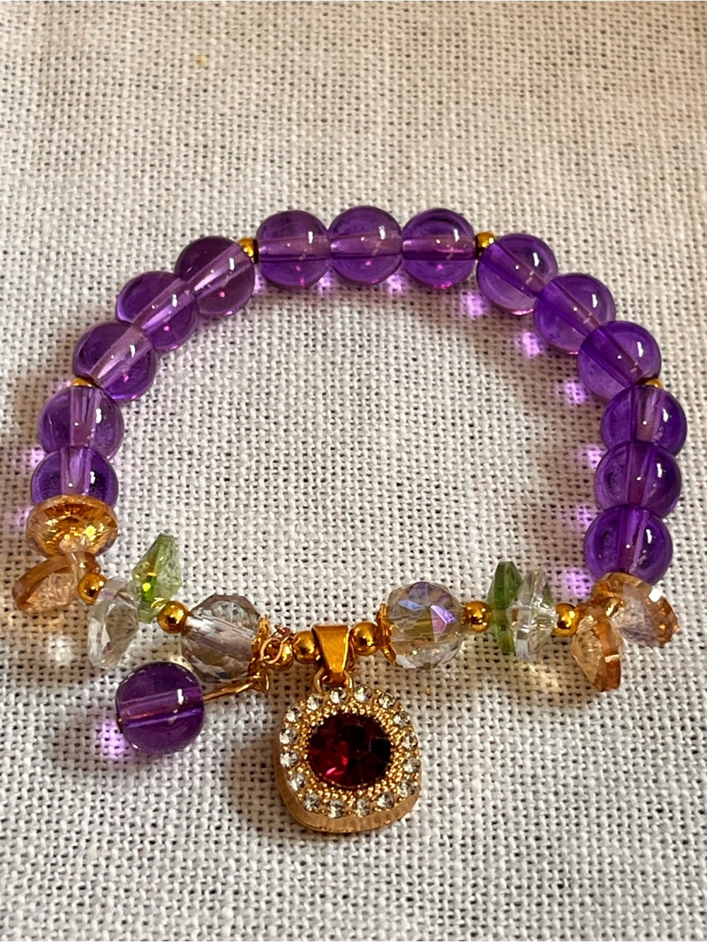 Amethyst Beaded Bracelet with Gold Red-Center Charm